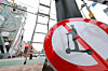 Workers install signage in Mapo District, western Seoul on May 15, a day before the launch of an e-scooter-free zone. [YONHAP]