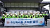 Posco-Pilbara Lithium Solution CEO Lee Kyung-sup, sixth from the left in the front row, and other executives take a photo celebrating the shipment of the first batch of lithium hydroxide at its factory in South Jeolla on April 16. [POSCO HOLDINGS]