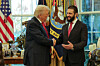 In this photo released by Syrian Presidency press office, U.S. President Donald Trump, left, shakes hands with Syria's President Ahmad al-Sharaa, at the White House in Washington on Nov. 10. [AP/YONHAP]