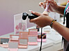 A visitor tests cosmetics at the 2025 Seoul Beauty Week held at Dongdaemun Design Plaza in Jung District, Seoul, on Aug. 28 in this photo unrelated to the story. [YONHAP]