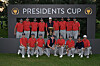 U.S. Team players pose for a photo with the Presidents Cup Trophy after winning the 2024 Presidents Cup at The Royal Montreal Golf Club on Sept. 29 in Montreal, Quebec. [GETTY IMAGES