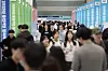 Job seekers attend a job fair for middle-sized companies held at Coex in Gangnam District, southern Seoul, on April 21. [YONHAP]