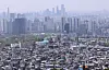 Apartment complexes and multiunit houses are seen together in Seoul on April 28. [NEWS1]