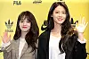 Members Jimin, left, and Seolhyun of girl group AOA on April 13, 2018 [YONHAP]