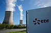 The logo of Electricite de France (EDF) is seen in front of cooling towers at the entrance of the nuclear power plant site, in Civaux, France, March 19, 2024. [REUTERS]