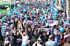 Supporters of Democratic Party leader Lee Jae-myung celebrate outside the Seoul High Court in Seocho District, southern Seoul, on March 26, after the court acquitted him on all counts of lying during his last presidential campaign. [NEWS1]
