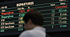 An electric display board showing train arrival and departure times are seen at Daejeon Station in Daejeon on July 17. [YONHAP]