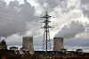 A view shows the cooling towers and the reactors of the EDF nuclear power plant in Cattenom, France, February 14, 2022. [REUTERS]