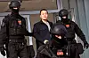 Montenegrin police officers of the PJP (Special Police Unit) escort Korean cryptocurrency entrepreneur Do Kwon, center, at the exit of a court in Podgorica, Montenegro, on March 23, 2024. [AFP/YONHAP]