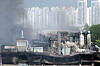 Black smoke appears above Kumho Tire Factory in Gwangju on the morning of May 18 as fire authorities continue to work to extinguish the fire that broke out the previous morning. [YONHAP]