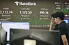 The Kospi and Kosdaq indexes are displayed in the dealing room of Hana Bank’s headquarters in Jung District, central Seoul, on July 9. [YONHAP]