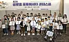 Choi Ji-young, executive editor of the Korea JoongAng Daily, second row, far left, and winners of the Korea JoongAng Daily's second Global Photo Essay Contest pose for a photo while holding their awards at the JoongAng Ilbo building in Mapo District, western Seoul, on Saturday. [PARK SANG-MOON]