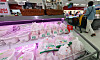 Raw chicken is stocked in a refrigerator at a supermarket in Seoul on May 23. [NEWS1]