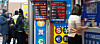 Customers at a currency exchange in Jung District, central Seoul, are seen on Jan. 7. [NEWS1]