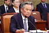 Lee Kee-heung, president of the Korean Sport and Olympic Committee (KSOC), listens to a question at a parliamentary audit held on Oct. 22, 2024. [YONHAP]