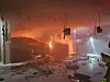 A fire breaks out in a Mercedes-Benz EV in the underground parking garage of an 1,800-household apartment complex in Suwon, Gyeonggi, on Oct. 5. [GYEONGGI FIRE AND DISASTER HEADQUARTERS]