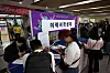 Job seekers make resumes at the “2025 Hope, Happiness and Future Job Fair” at Yeongdeungpo Art Hall in Yeongdeungpo District, western Seoul, on April 30. [JOONGANG ILBO]