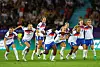 England's Chloe Kelly, Esme Morgan, Michelle Agyemang, Beth Mead, Lauren James, Niamh Charles, Lucy Bronze, Alessia Russo and Grace Clinton celebrate winning the penalty shootout at the UEFA Women's Euro 2025 quarter final match between England and Sweden at Stadion Letzigrund in Zurich, Switzerland on July 17. [REUTERS/YONHAP]