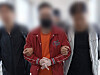 A Korean man in his 50s is extradited from Ecuador to Korea on June 12 on charges that he operated a pornographic website depicting the exploitation of women and children. The man is seen in this picture taken at the Incheon International Airport. [MINISTRY OF JUSTICE]
