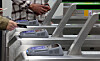 Passengers tap their cards at ticket barriers in a subway station in Seoul. [NEWS1]