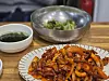 Byeolmi Bokkeum's flame-grilled mix of pork belly and squid [JIN EUN-SOO]