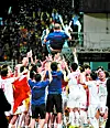 Coach Park and his team celebrating after the SEA win in 2019. [EPA/YONHAP]