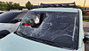 The windshield of a car is seen shattered by citizens after a man tried to escape in the vehicle following an attack in which he stabbed and injured a woman in a hospital parking lot in Buk District, Ulsan, on July 28. [YONHAP]
