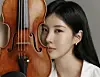 Seohyun of Girl's Generation poses with a violin [KKUM ENT]
