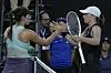 Iga Swiatek, of Poland, right, is congratulated by Jessica Pegula, of the United States, in her victory at the WTA Finals in Cancun, Mexico on Monday. [AP/YONHAP]