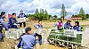 A photo depicting a rice planting operation appears on the front page of North Korea’s official Rodong Sinmun on May 11. [RODONG SINMUN]