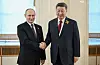 President of Russia Vladimir Putin and President of China Xi Jinping shake hands after arrival in the Kremlin for a gala concert held for heads of foreign delegations, in Moscow on May 8, 2025, ahead of celebrations of the 80th anniversary of the Soviet Union's victory over Nazi Germany during World War II. [AP/YONHAP]