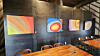 Paintings hang at a cafe in North Jeolla during a solo exhibition by a local police chief. [JOONGANG ILBO]