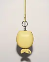 La Pomme Crossbody, an apple-shaped small leather bag which pays tribute to ″Les Jeunes Amours″ (1963), or ″The Young Loves,″ by Belgian Surrealist artist Rene Magritte (1898-1967). [DELVAUX]