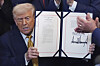 U.S. President Donald Trump poses for a photo after signing the ″Halt All Lethal Trafficking of Fentanyl Act,″ during a ceremony in the East Room of the White House on July 16 in Washington. [AP/YONHAP]