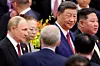 Chinese President Xi Jinping, center, Russian President Vladimir Putin, left, and North Korean leader Kim Jong-un arrive for a reception marking the 80th anniversary of the end of World War II at the Great Hall of the People in Beijing on Sept. 3, 2025. [REUTERS/YONHAP]
