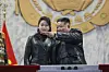 North Korean leader Kim Jong-un, right, attends the Ninth Congress of the Workers' Party of Korea in Pyongyang on Feb. 25 with his daughter, Kim Ju-ae. [NEWS1]