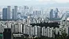 Apartment buildings in central Seoul are seen from Namsan in Jung District on June 24. [NEWS1]