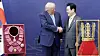 U.S. President Donald Trump moves to shake hands with Korean President Lee Jae Myung as he receives a gift of a gold crown and an award of the Grand Order of Mugunghwa, not seen, during a high honor ceremony at the Gyeongju National Museum in Gyeongju, North Gyeongsang, Oct. 29. [AP/YONHAP]