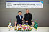 Hyundai Transys CEO Steve Yeo, left, shakes hands with CEER CEO James DeLuca after signing a $2.2 billion EV parts deal at the company's headquarters in Hwaseong, Gyeonggi. [HYUNDAI TRANSYS]