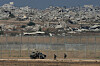 Israeli troops are seen near the Gaza Strip border in southern Israel on Sept. 30. [AP/YONHAP]