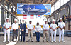 Fourth from right: Peruvian Prime Minster Gustavo Adrianzén, President Dina Boluarte and Peru Minister of Defense Walter Astudillo pose for the camera during a shipbuilding launch ceremony on Jan. 10 in Peru's Servicios Industriales de la Marina Shipyard. [HD HYUNDAI HEAVY INDUSTRIES]