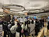 Customers line up at the Boochang Jegwa hodu gwaja (walnut pastry) store located inside Starfield Suwon in Gyeonggi. [FG]