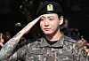 Member Jungkook of boy band BTS salutes to fans after finishing their military duties on June 11 in Yeoncheon, Gyeonggi. [NEWS1]