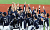 The Korean baseball team celebrate after beating Chinese Taipei 2-0 in the final of the Asian Games baseball tournament in Hangzhou, China on Saturday.  [NEWS1]