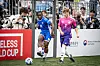 Korea's Fossi Wandji, left, competes for the ball during the opening game of the 2024 Homeless World Cup against Germany at Hanyang University in eastern Seoul on Saturday. [HOMELESS WORLD CUP]