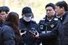 The first mate of the Queen Jenuvia II ferry, accused of grounding the ship off the coast of Shinan County, South Jeolla on Nov. 19, appears for questioning at the Gwangju District Court's Mokpo branch on Nov. 22. [NEWS1]