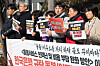 Members of the Korean Public Service and Transport Workers’ Union protest the Bank of Korea (BOK) March report that proposed solutions aiming to lower the cost of domestic workers in front of the BOK office in central Seoul on March 13. [NEWS1]