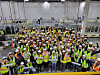 Ultium Cells workers take a photo with the first batch of EV batteries produced at its second plant in Spring Hill, Tennessee. [LG ENERGY SOLUTION]