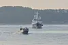 A Chinese high-speed boat, caught northwest of Seogyeongnyeolbi Island, about 51 nautical miles off Taean County, South Chungcheong, is being towed to Sinjin Port on April 29. [TAEAN COAST GUARD]