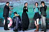 The hosts of Netflix’s hit dating show “Single’s Inferno” (2021-) pose for photos at a press conference held on Jan. 8 at Hotel Naru Seoul MGallery in Mapo District, western Seoul. From left are Hanhae, Dex, Hong Jin-kyung, Lee Da-hee and Kyuhyun. [NEWS1]